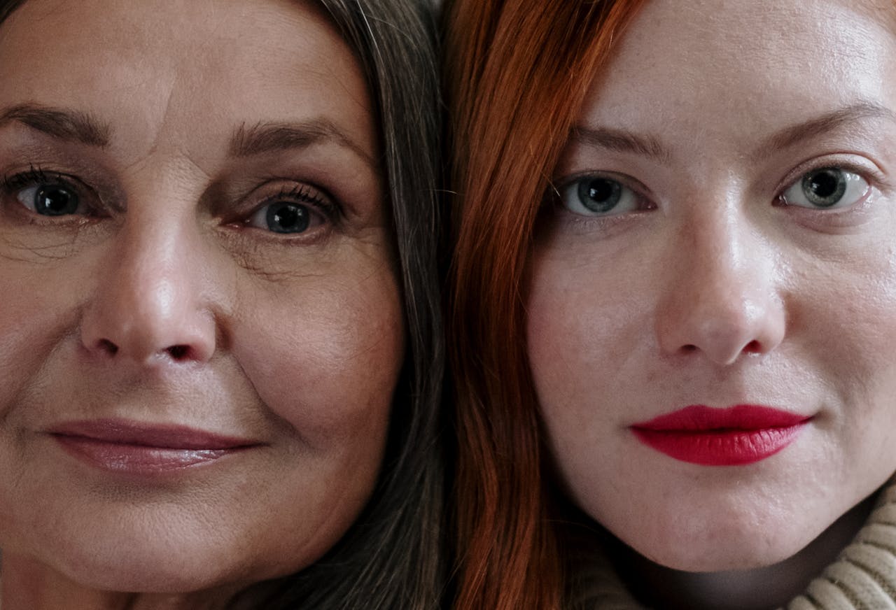 Close-up portrait highlighting the beauty and diversity of two women side by side.